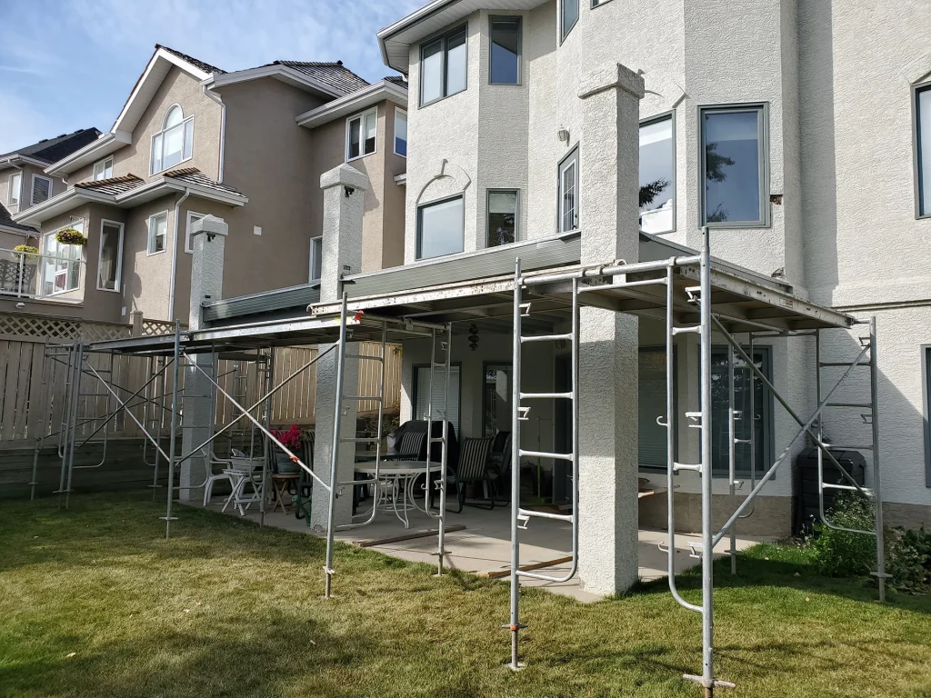 Stucco repair project on a house in Calgary, AB.